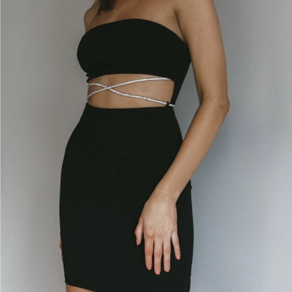 Diamanté black minidress
Cut out